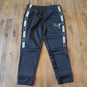Puma Kids Black Joggers with Logo Stripes size 5